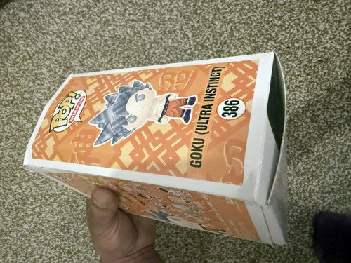 Funko Pop Dragon Ball Super Goku Ultra Instinct #386 Vinyl Figure - Box Damaged